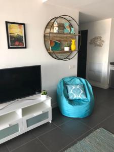 A television and/or entertainment centre at Beach Life