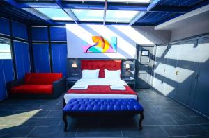 Postel nebo postele na pokoji v ubytování Batumi Palm Hotel