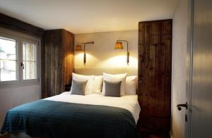 Letto o letti in una camera di La Cordée des Alpes SUP