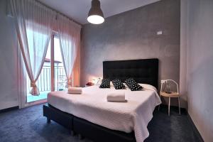 Säng eller sängar i ett rum på Hotel Concordia