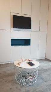 TV o dispositivi per l'intrattenimento presso Apartments REST - Centar