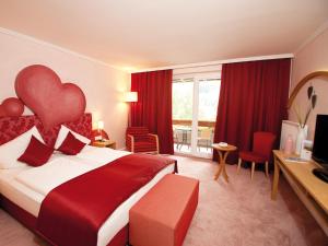 Postel nebo postele na pokoji v ubytování Evident Hotel Prägant 4-Superior