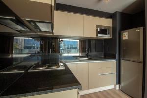 Kuchyň nebo kuchyňský kout v ubytování One Nk Apartments + 37 fotografií