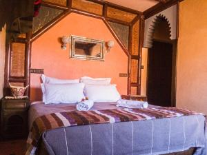Voodi või voodid majutusasutuse Riad Atlas Panorama toas