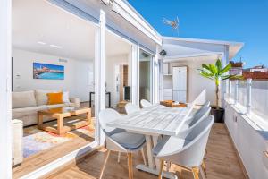 Balkon lub taras w obiekcie iloftmalaga Ático Plaza de las Flores