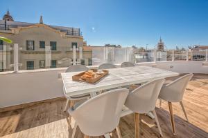 Balkon lub taras w obiekcie iloftmalaga Ático Plaza de las Flores