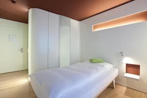 Voodi või voodid majutusasutuse Hotel Dom - das Hotel mit dem Integrationskonzept toas