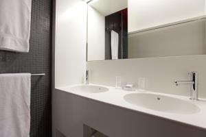 Vannituba majutusasutuses Hotel Dom - das Hotel mit dem Integrationskonzept