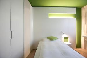 Voodi või voodid majutusasutuse Hotel Dom - das Hotel mit dem Integrationskonzept toas