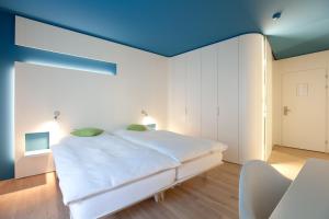 Voodi või voodid majutusasutuse Hotel Dom - das Hotel mit dem Integrationskonzept toas