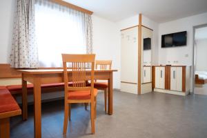 Televízia a/alebo spoločenská miestnosť v ubytovaní Seilergasse Apartments by we rent, SUMMERCARD INCLUDED