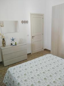 Postel nebo postele na pokoji v ubytování Villa Rollo