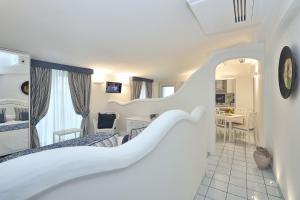 A bed or beds in a room at Villa Gelsomina