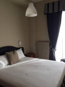 Postel nebo postele na pokoji v ubytování Hotel delle Terme & Spa