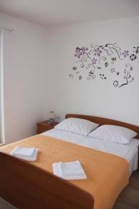 Voodi või voodid majutusasutuse Guesthouse Santor toas