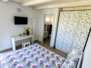 Postel nebo postele na pokoji v ubytování Villa Il Sole