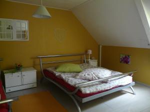 
Ein Bett oder Betten in einem Zimmer der Unterkunft Ten Huize Peckeneck
