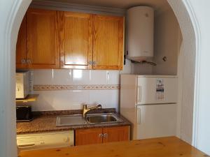 Küche/Küchenzeile in der Unterkunft Amber Family Apartment