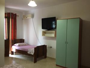 Postel nebo postele na pokoji v ubytování Hotel Moris
