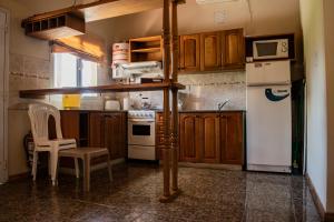 Η κουζίνα ή μικρή κουζίνα στο Complejo Las Calandrias