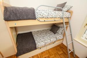 Postel nebo postele na pokoji v ubytování Apartment Gala with balcony and private parking