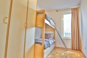 Postel nebo postele na pokoji v ubytování Apartment Gala with balcony and private parking