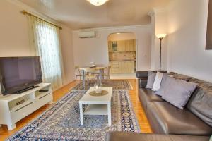 Posezení v ubytování Apartment Gala with balcony and private parking