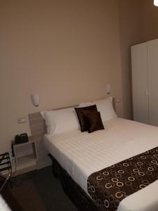 Postel nebo postele na pokoji v ubytování Hotel delle Terme & Spa