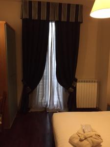Postel nebo postele na pokoji v ubytování Hotel delle Terme & Spa
