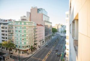 Nespecifikovaný výhled na destinaci Lisabon nebo výhled na město při pohledu z apartmánu