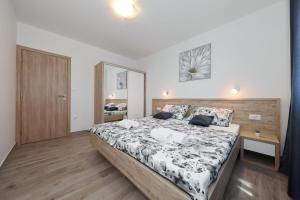 Postel nebo postele na pokoji v ubytování Villa Silver