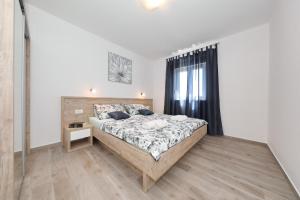 Postel nebo postele na pokoji v ubytování Villa Silver