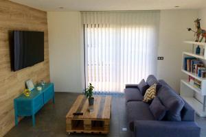 Μια τηλεόραση ή/και κέντρο ψυχαγωγίας στο Villa entre Mer et Montagne...