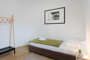 Posteľ alebo postele v izbe v ubytovaní Apartmani Mursa