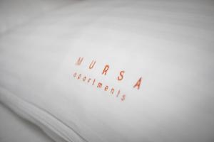 Posteľ alebo postele v izbe v ubytovaní Apartmani Mursa