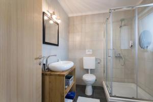 Kúpeľňa v ubytovaní Apartmani Mursa
