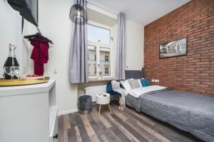 Posteľ alebo postele v izbe v ubytovaní Liv Apartments Old Town