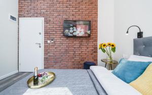 Televízia a/alebo spoločenská miestnosť v ubytovaní Liv Apartments Old Town