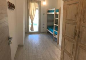 Posteľ alebo postele v izbe v ubytovaní Villa della pietra
