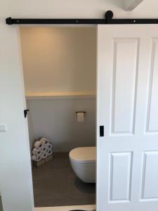 Ett badrum på Appartement Havenzicht
