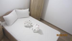 Postel nebo postele na pokoji v ubytování Casa Nicholas