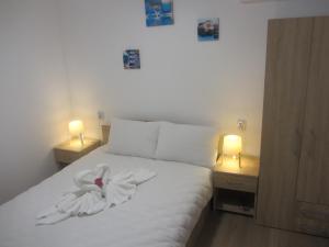 Postel nebo postele na pokoji v ubytování Casa Nicholas