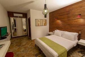 Ліжко або ліжка в номері Hotel Casa De Padre