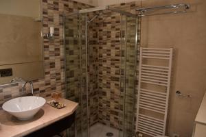Kúpeľňa v ubytovaní Apartment Vikroria - Hálkova 5