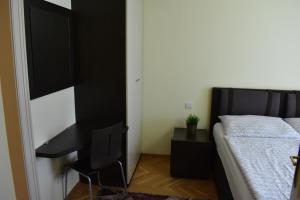 Postel nebo postele na pokoji v ubytování Apartment Vikroria - Hálkova 5
