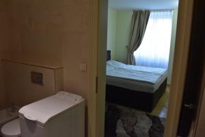 Posteľ alebo postele v izbe v ubytovaní Apartment Vikroria - Hálkova 5 + 28 fotografií
