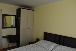 Posteľ alebo postele v izbe v ubytovaní Apartment Vikroria - Hálkova 5
