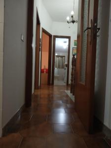 a hallway of a house with a tile floor at Casa Giordano Holidays in Tramonti