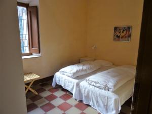 Katil atau katil-katil dalam bilik di Villa Garibaldi