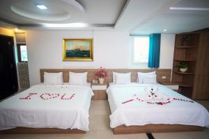 Postel nebo postele na pokoji v ubytování H79 HOTEL